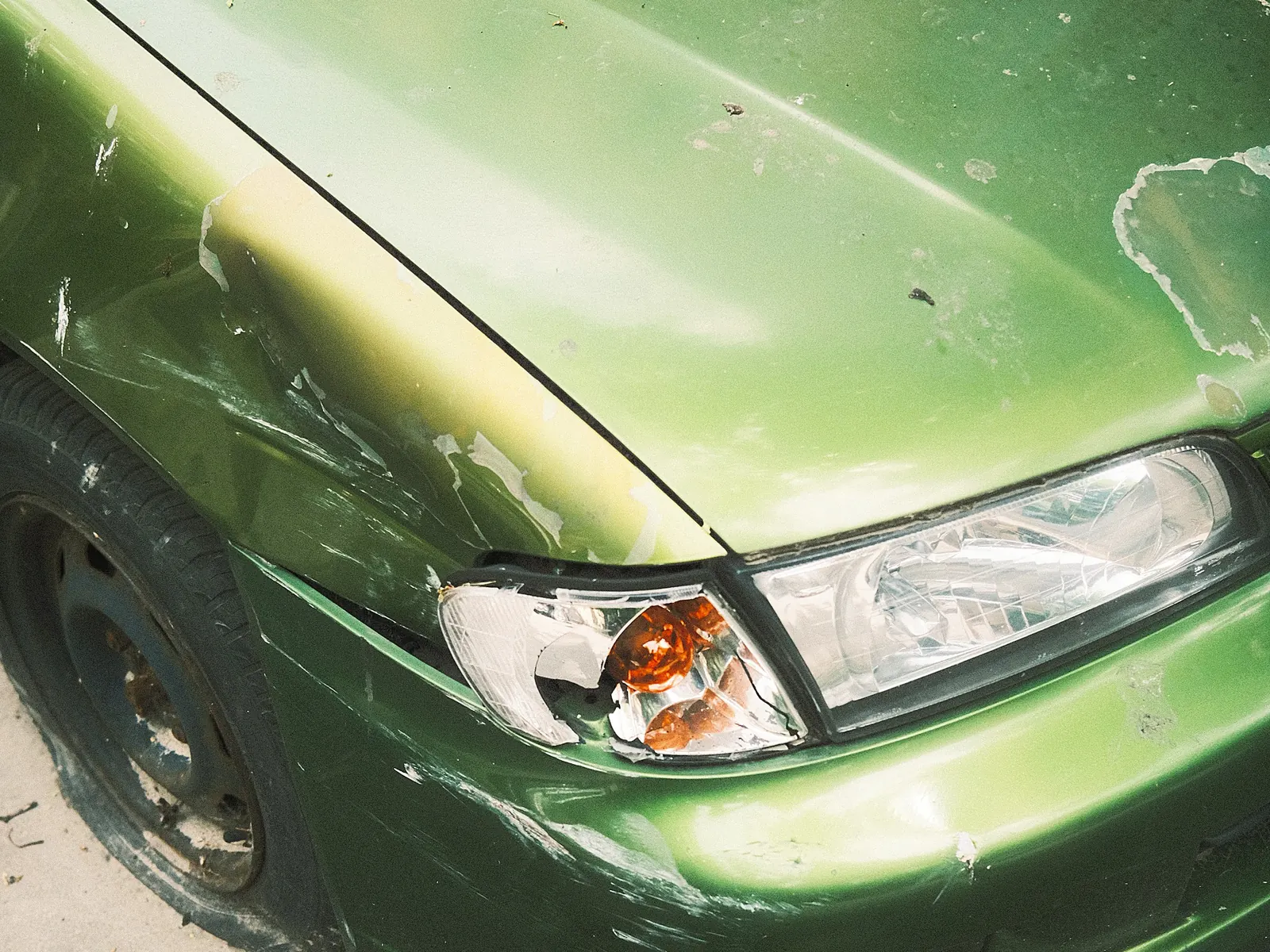 Car with a damaged front bumper