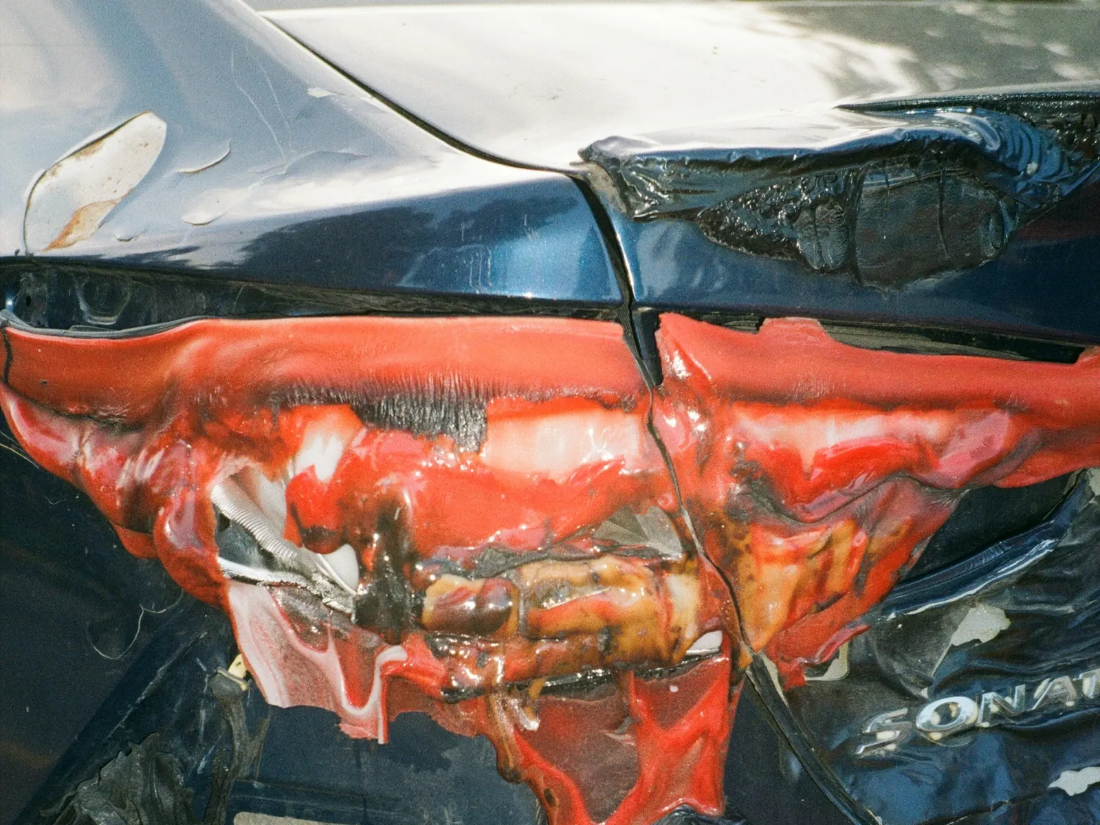 Rear collision damage on a car